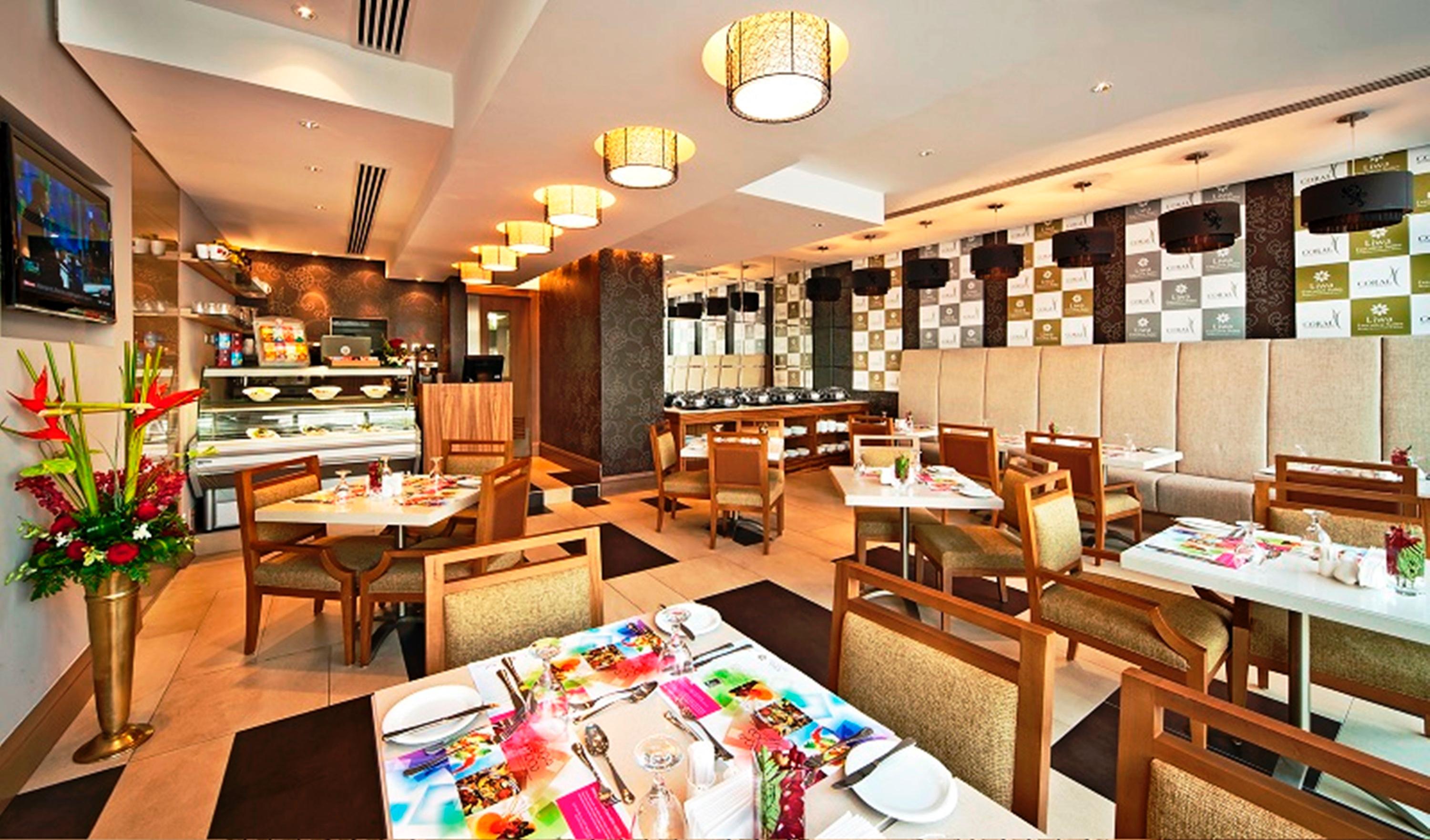 Oaks Liwa Executive Suites Abú Dhabí Restaurace fotografie